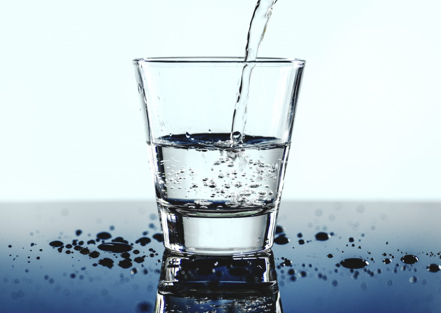 glass of water macro shot scaled